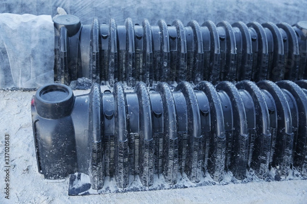 Fototapeta sewage system
septic leach field under constructions or
leachfield chamber. Pattern of groundwater pipe. Close-up