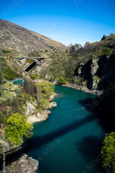 Obraz Beautiful view of a canyon with the bridge in the background taken on a sunny spring day in Kawarau Bridge, New Zealand
