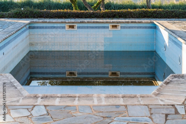 Obraz empty and dirty blue ceramic pool