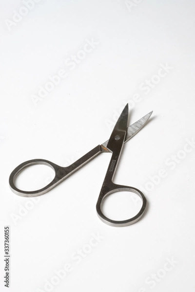 Obraz small scissors on a white background