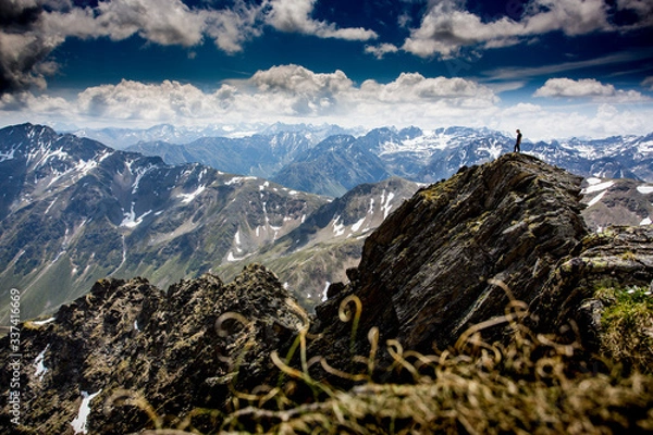 Obraz Wanderer standing on the summit of Rietzer Grießkogel