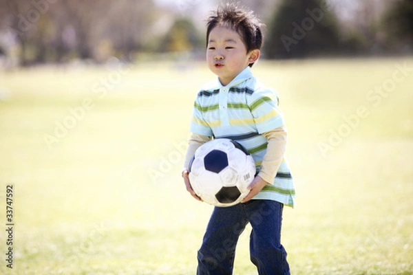 Obraz サッカーボールを持つ男の子