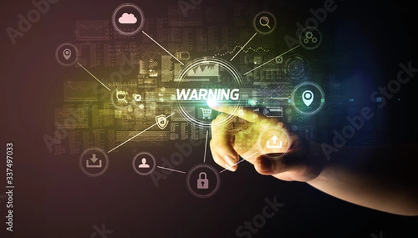 Fototapeta Hand touching WARNING inscription, Cybersecurity concept