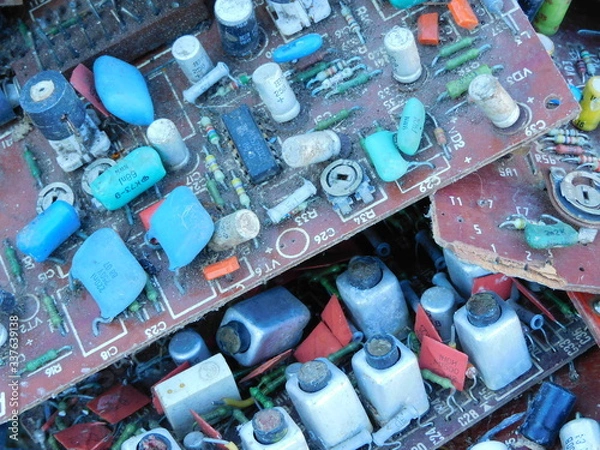 Obraz 
Scrap radio components: a board on which many different elements