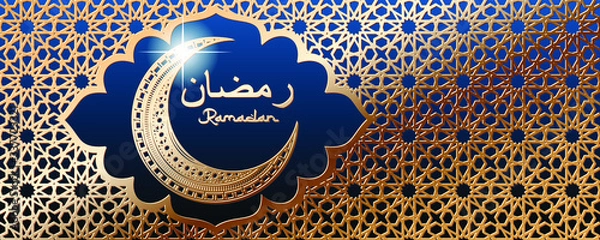 Fototapeta Luxury Golden ornamental half moon and Ramadan arabic text in golden frame with girih traditional ornament on blue background website header template. Arabic text translation Ramadan
