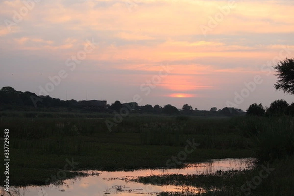 Obraz sunset over the river