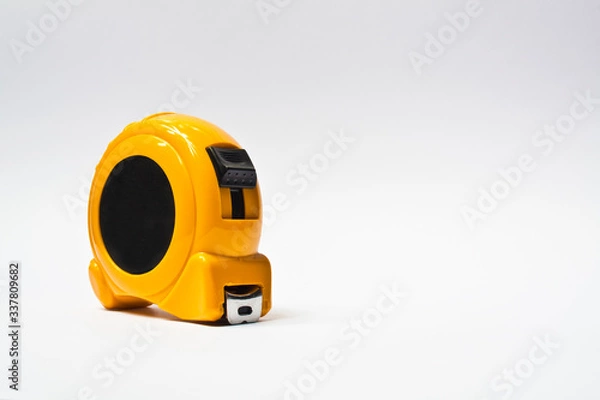 Fototapeta yellow color flexometer, construction tool