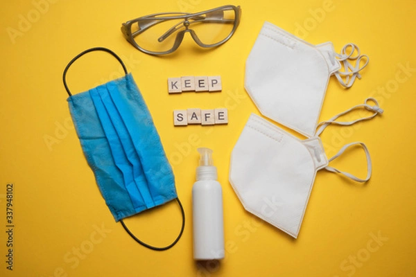 Fototapeta safety first concept with personal protection for workers on bright background