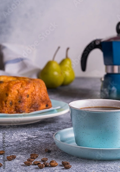 Fototapeta Cup of black coffee , beans, and cake with pouring chocolate, blurred bokeh background.