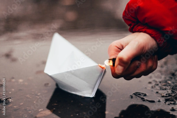 Fototapeta paper boat on fire