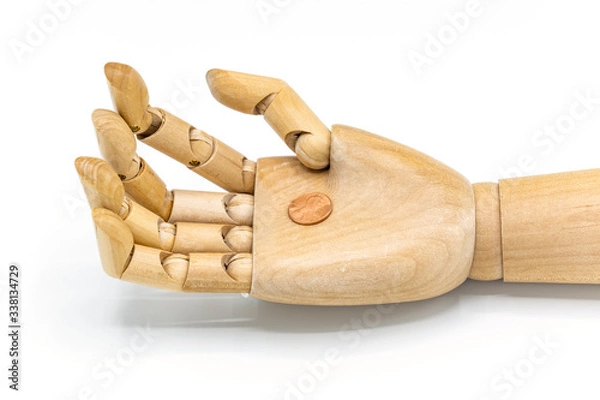 Obraz Single US penny in wooden art model hand