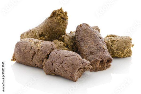 Fototapeta Dog shit. Pile of dog excrements on white bg. Isolated on white background with shadow reflection. With clipping path. With vector path. Dog feces, studio shot. Closeup shot. Cock of dog's turds.