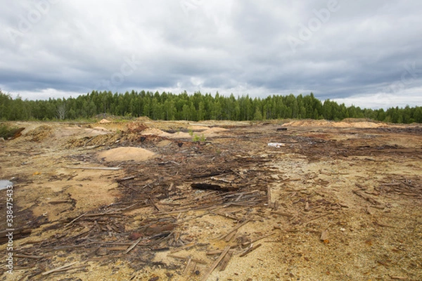 Fototapeta Dull landscape on abandoned mining site with surface dump