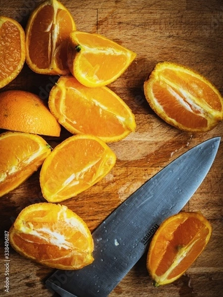 Fototapeta Oranges and knife