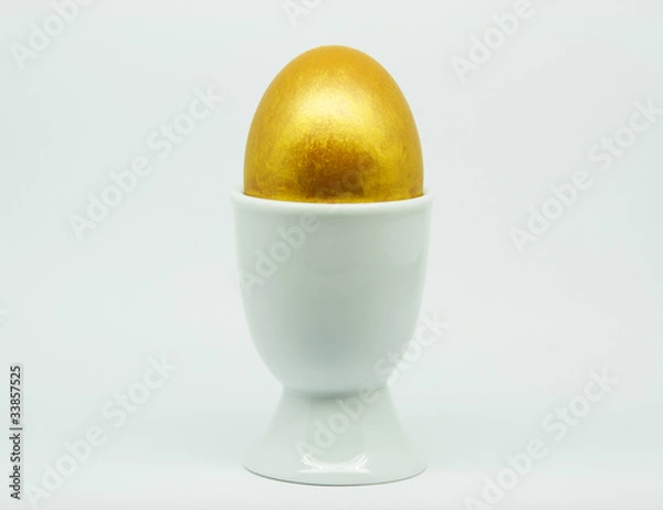 Obraz Golden Egg in an egg cup