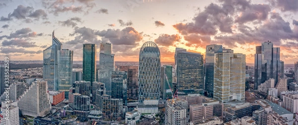 Obraz Aerial panoramic drone shot of La Defense skycraper in Paris CBD skyscraper complex business district with clouds during sunset