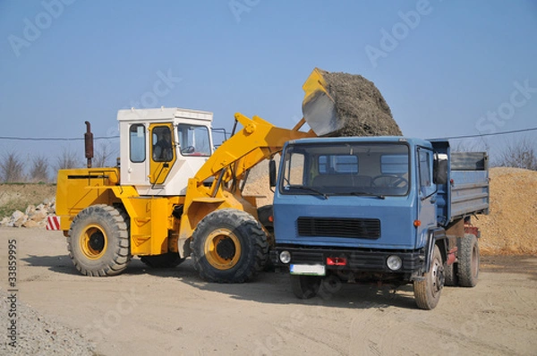 Obraz excavator loading truck