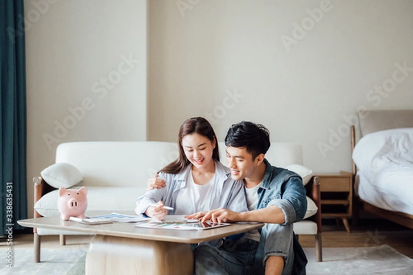Fototapeta Asian couple at home Financial management