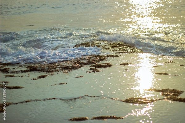 Obraz A shot of the Indian Ocean waves crashing on Rocky beach of Neil Island