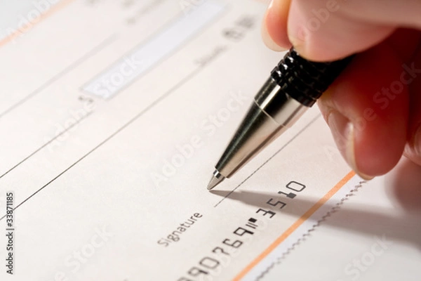 Fototapeta Writing a check