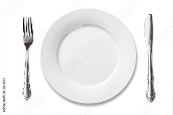 Fototapeta white china plate with silver fork and knife isolate on white