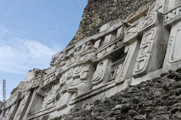 Obraz Hieroglyphics on the side of ancient Mayan Ruins.