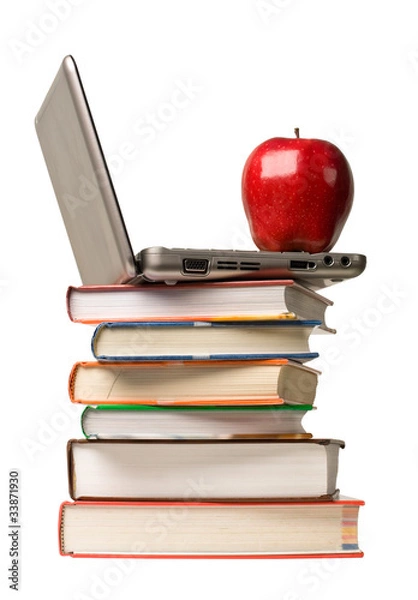 Fototapeta Red apple and computer on top of school books.