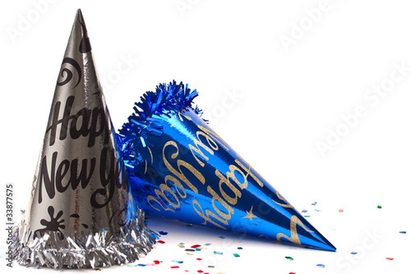 Fototapeta New year hat and confetti on white background.