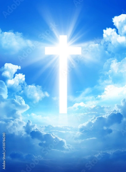 Obraz Cross in the cloudy sky with light rays