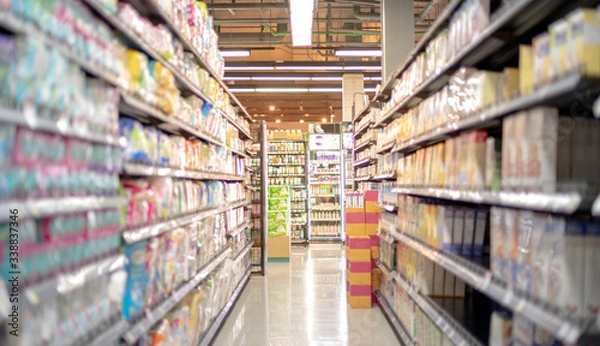 Fototapeta Full food at Shelves in a Supermarket prepare due to people panicking and hoarding groceries in fear of the CoronaVirus Outbreak.