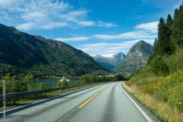 Fototapeta Norwegian mountain road with Josteldalsbreen glacier in the background