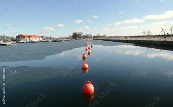 Obraz Czerwone boje na niebieskim tle 