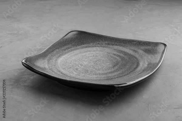 Obraz Grey square plate under the concrete for placing products.