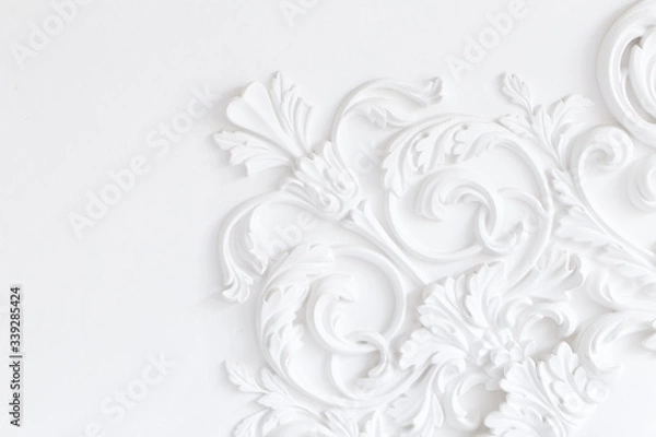 Obraz Beautiful ornate white decorative plaster moldings in studio.