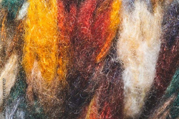 Fototapeta Colorful wool yarn. woolen fabric background. knitted textile