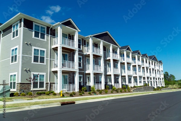 Fototapeta Typical suburban apartment building for rent