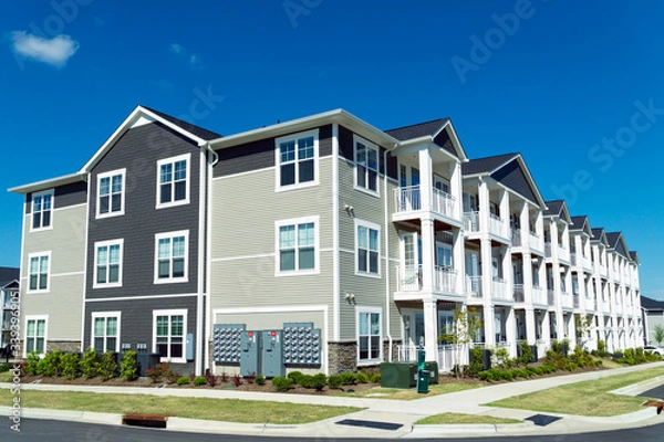 Fototapeta Typical suburban apartment building for rent