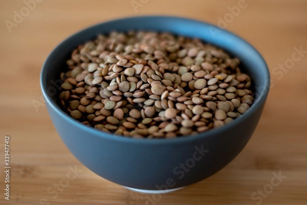 Fototapeta brown lentils in bowl