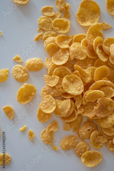 Obraz corn flakes on white surface