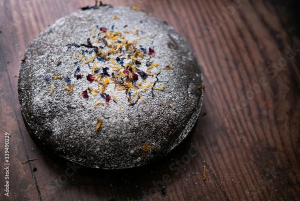 Obraz chocolate cake over a wood background
