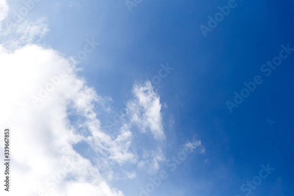 Fototapeta Blue sky background with clouds.