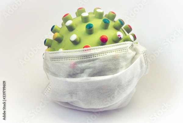 Obraz 
green virus in a medical mask