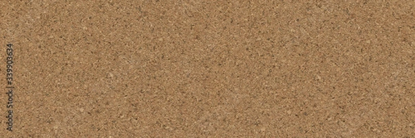 Fototapeta Empty cork memo board. High detail cork board background and texture brown yellow sheet. Beige recycled eco cork board background.