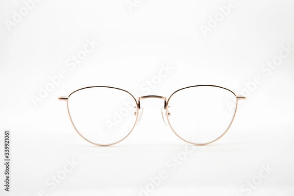 Obraz Pink eyeglasses with white background