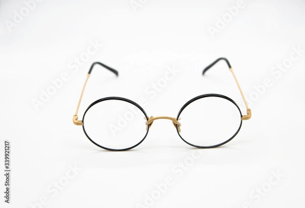 Obraz Black eyeglasses with white background