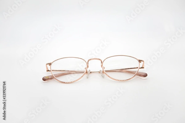 Obraz Pink eyeglasses with white background