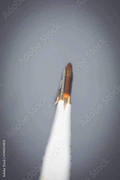 Fototapeta Spaceship launch. The elements of this image furnished by NASA.