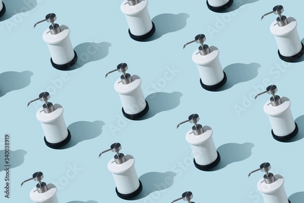 Fototapeta Dispenser for liquid soap, pattern on a blue background.