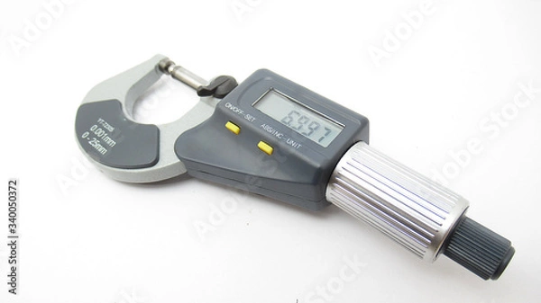 Fototapeta A isolated micrometer with a digital display,Located on white background,Easy to use in any work