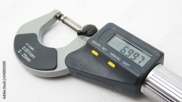 Fototapeta A isolated micrometer with a digital display,Located on white background,Easy to use in any work